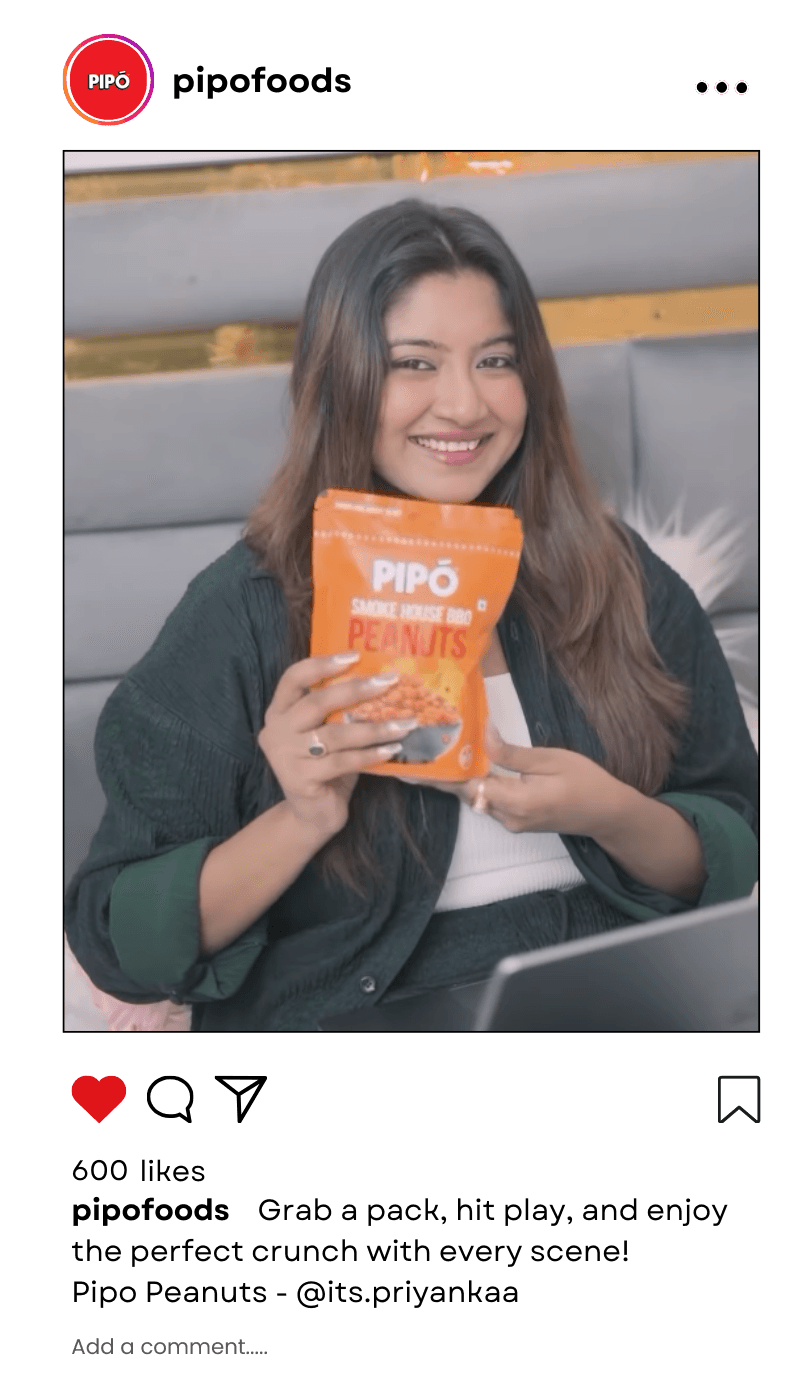 Mvisionary partners with influencers to boost Pipo Foods' brand, featuring a woman on her laptop enjoying Pipo peanuts.@its.priyankaa